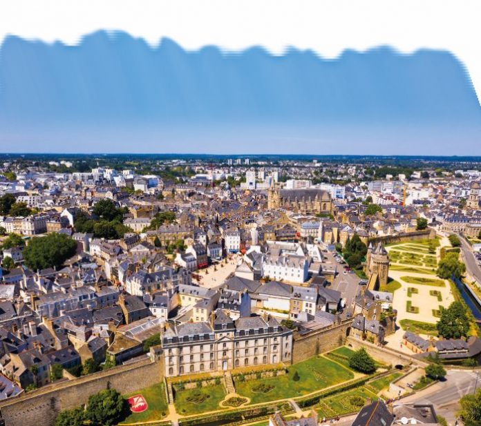 An aerial view of Vannes, overlooking its fortified city walls and lawns with floral design