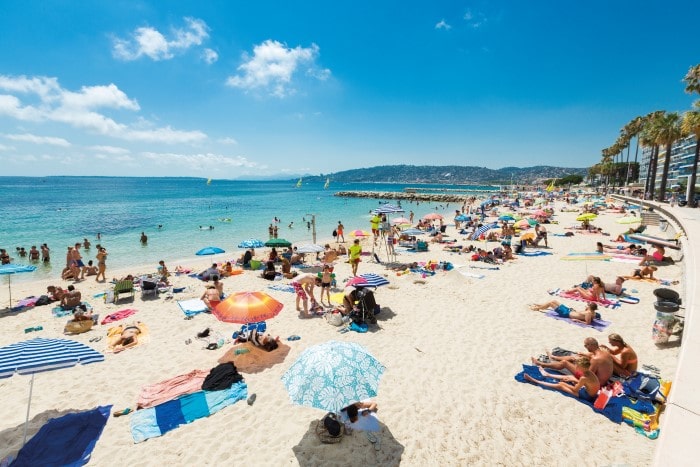 The pure white sands of a public beach in Juan-les-Pins