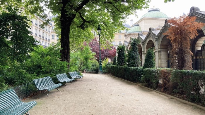 The peaceful setting of the Chapelle Expiatoire gardens and monument