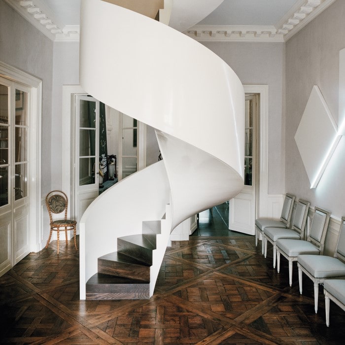 For his Paris apartment, formerly home to the writer Colette, Jacques Grange designed a metal and wood spiral staircase, inspired by Le Corbusier